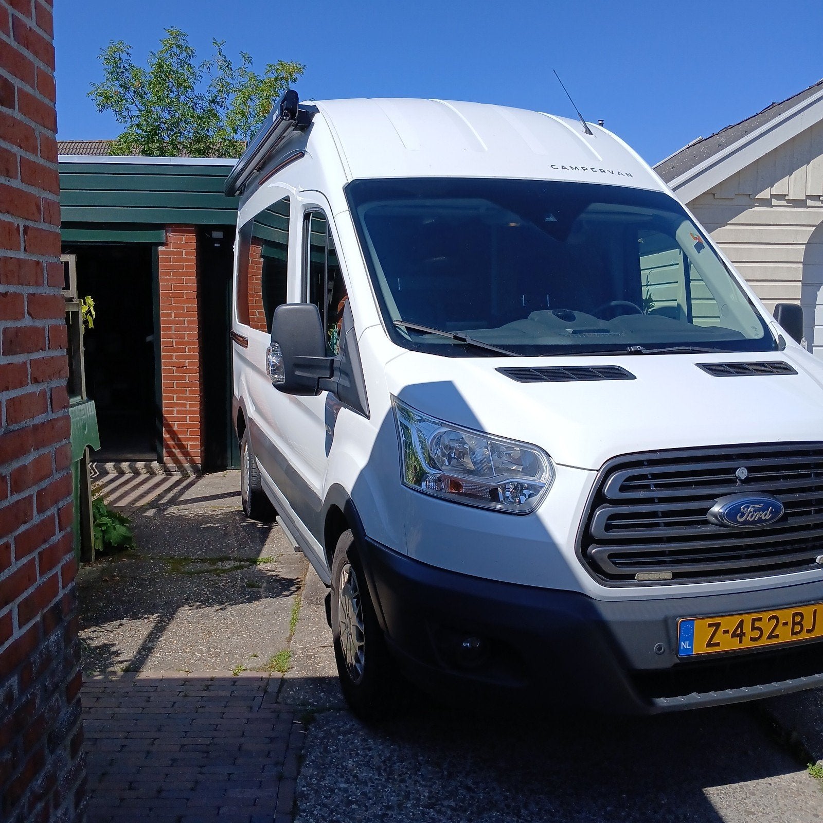 Compacte Ford Transit Camper met 2 aparte bedden, Luifel, Buscamper of Camperbus, Ford, Tot en met 2