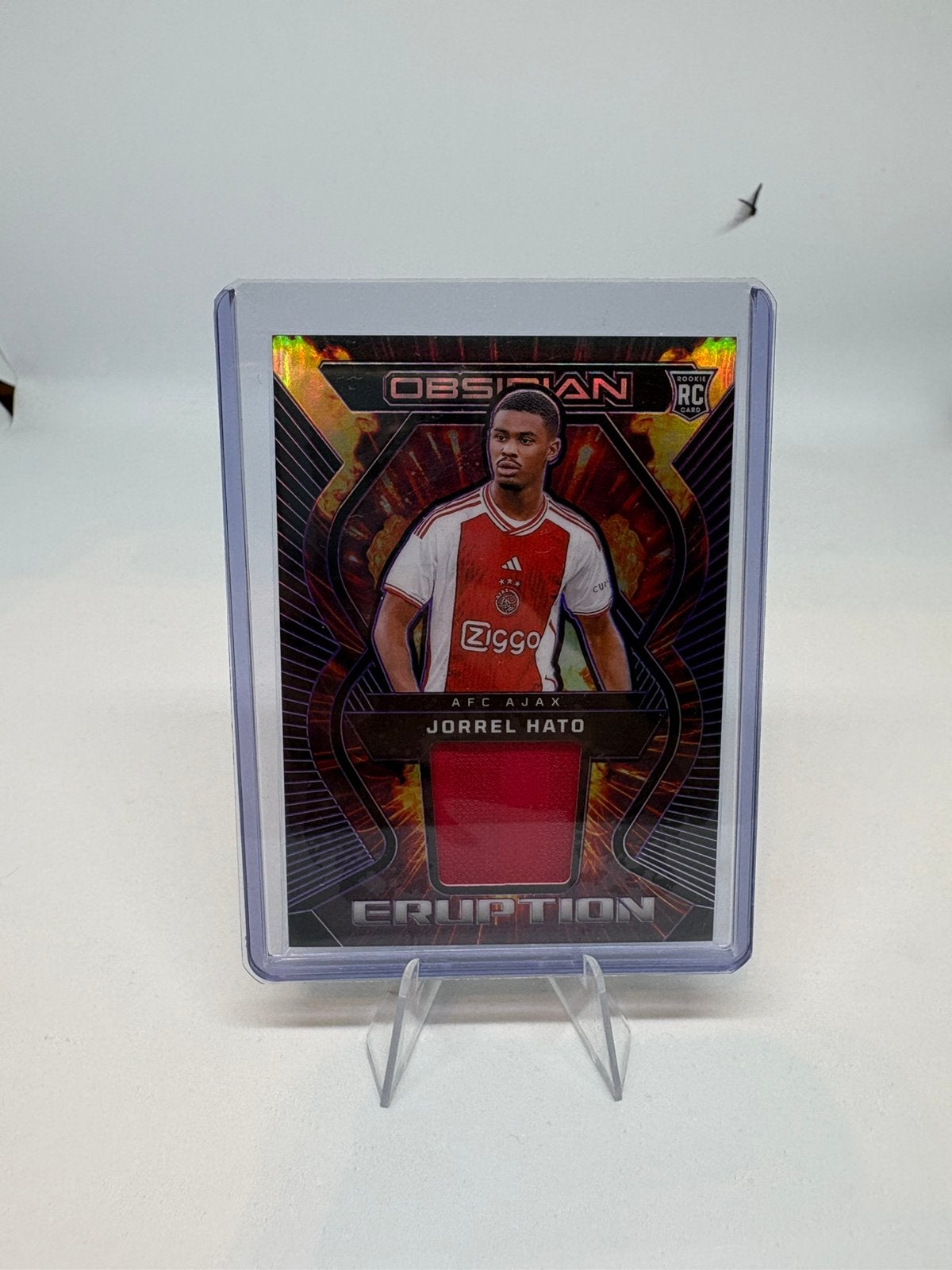Panini Obsidian 2023-24 Jorrel Hato Ajax RC Patch /50, Hobby en Vrije tijd, Stickers en Plaatjes, Ophalen of Verzenden, Zo goed als nieuw