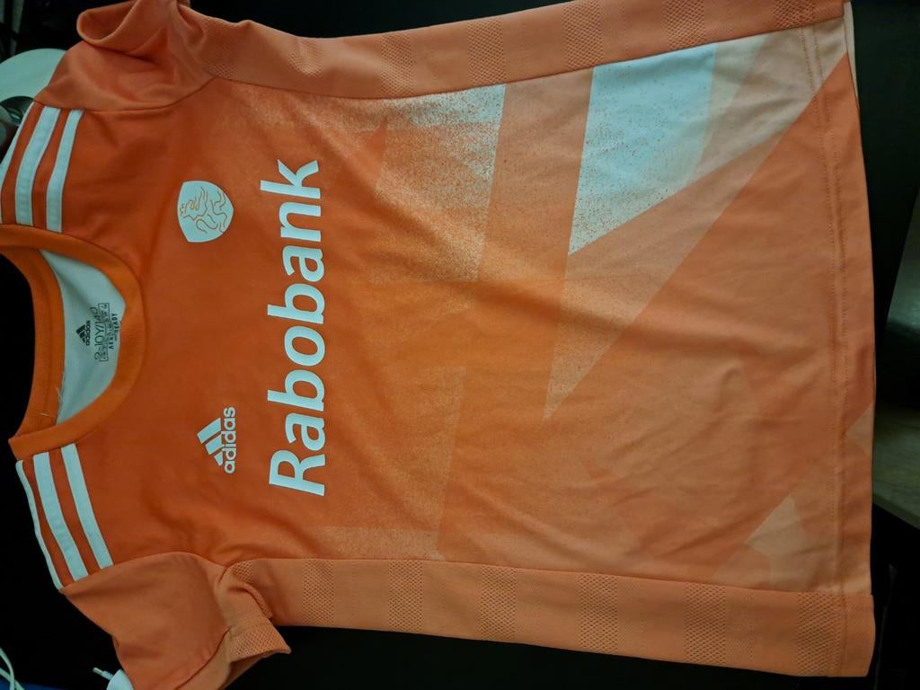 Meisjes oranje hockeyshirt, Ophalen of Verzenden, Zo goed als nieuw, Kleding