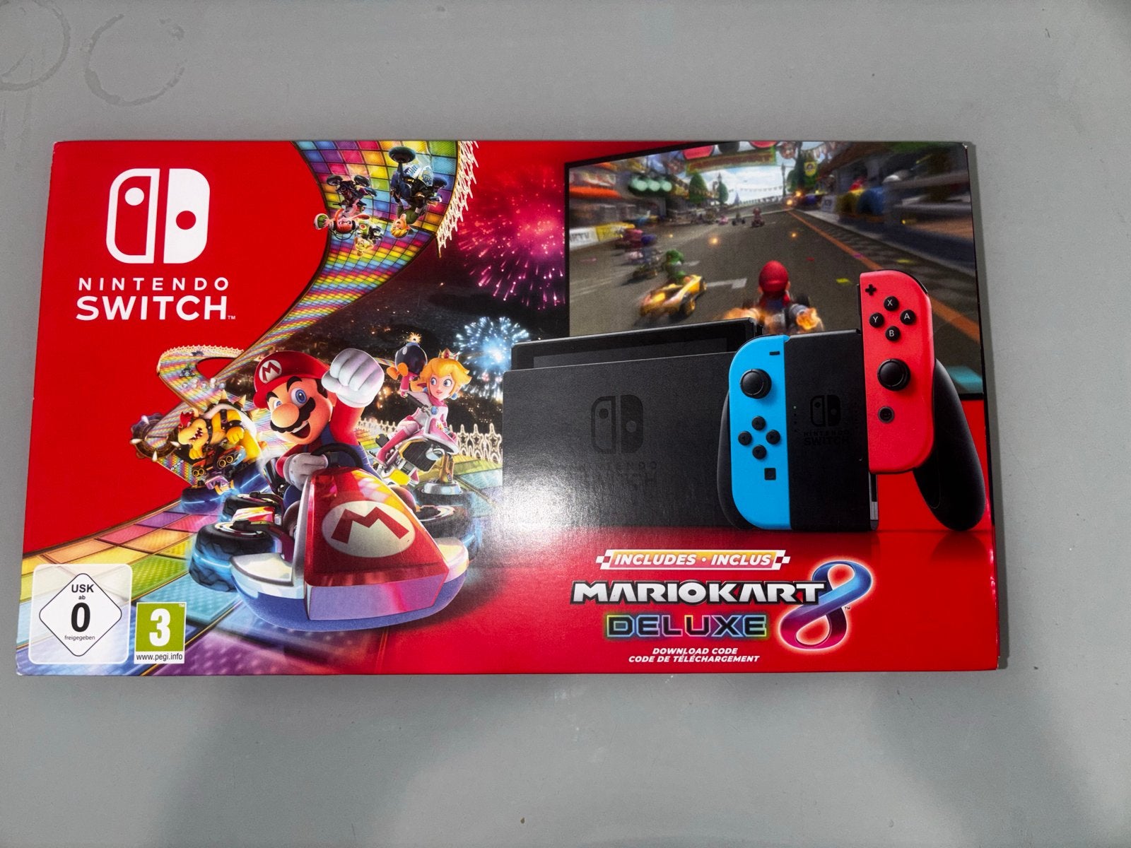 Nintendo Switch Mario Kart 8 Deluxe + 9 spellen, Met games, Ophalen of Verzenden, Zo goed als nieuw, Switch Original