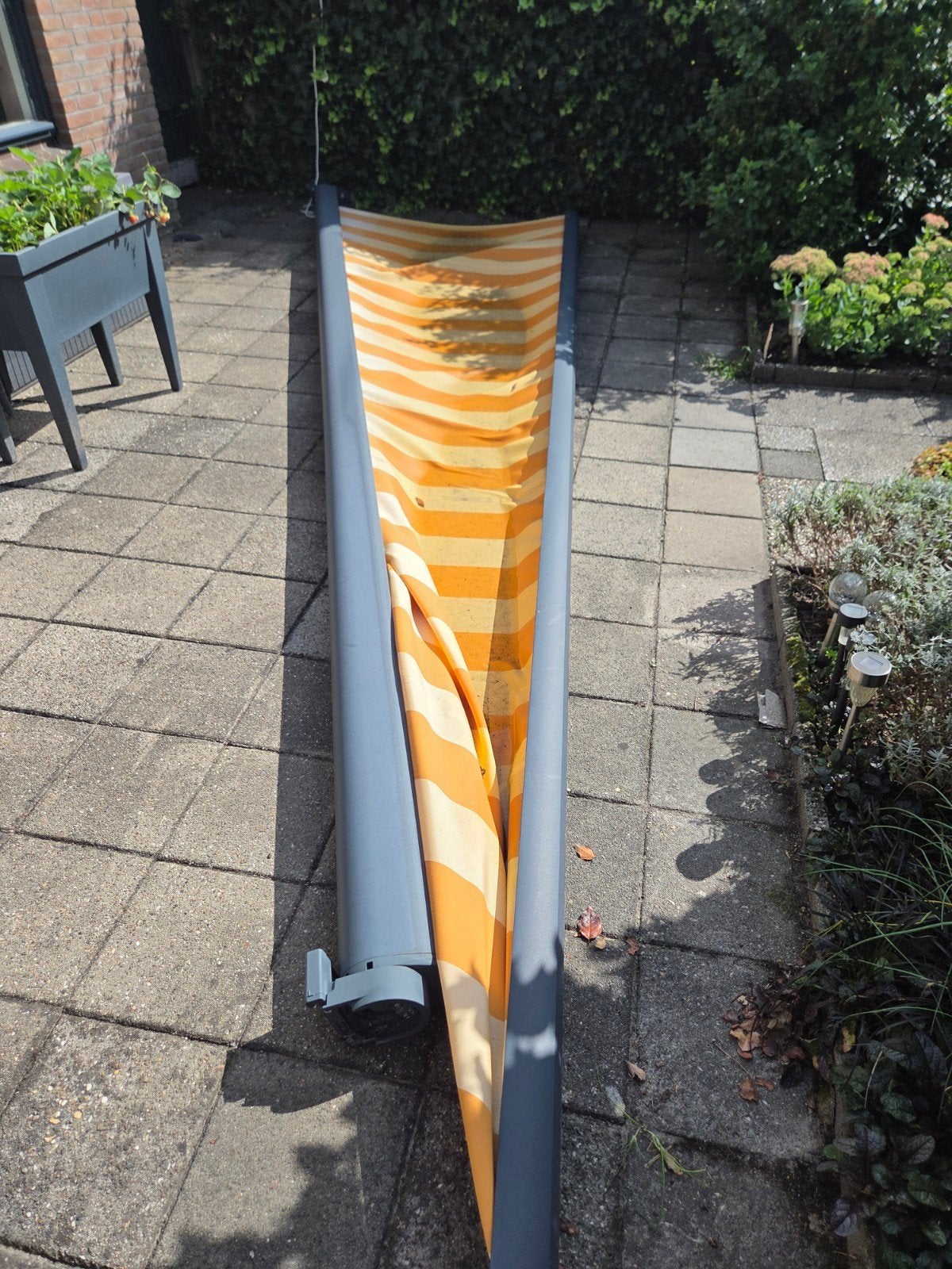 Elektrisch zonnescherm Verano 6x4m - arm defect, Ophalen, Gebruikt, 450 cm of meer, Elektrisch