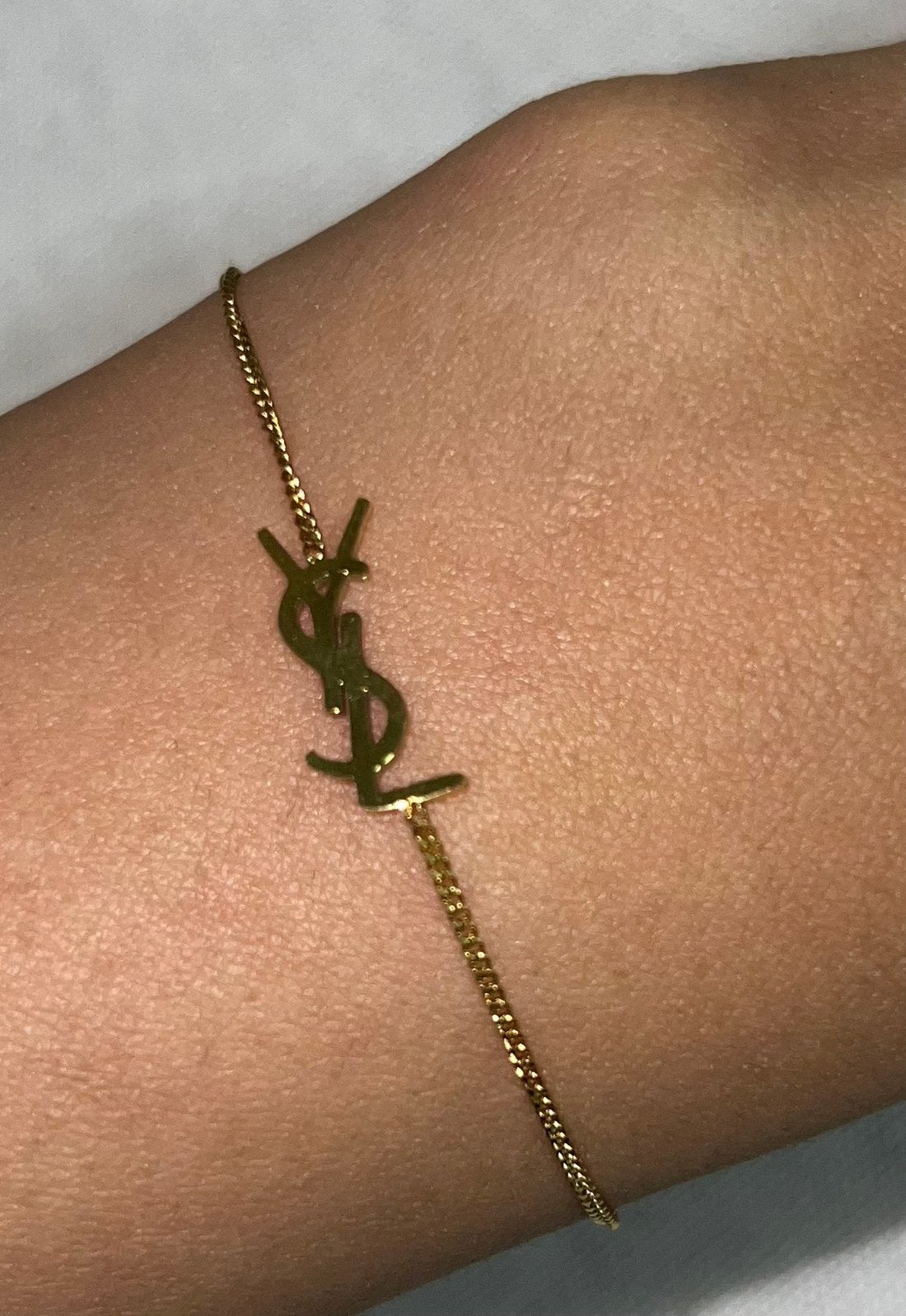 Ysl armband, Sieraden, Tassen en Uiterlijk, Armbanden, Ophalen of Verzenden, Zo goed als nieuw, Zwart, Goud