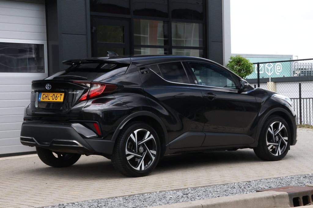 Toyota C-HR 2.0 Hybrid Dynamic| LED| Stoel-stuurverwarming |, Auto's, Toyota, Stof, 4 cilinders, Zwart, Bedrijf
