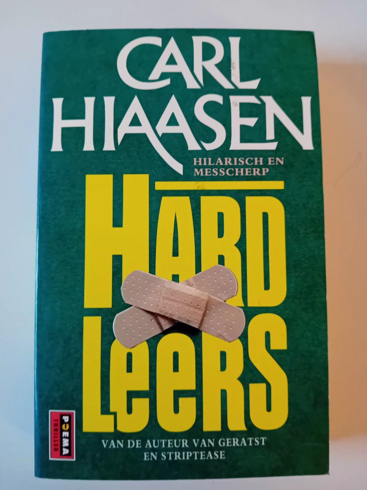 Hardleers  - Carl Hiaasen, Ophalen of Verzenden, Zo goed als nieuw