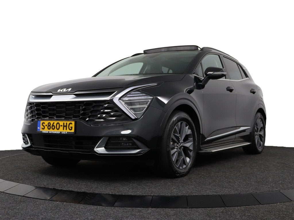 Kia Sportage 1.6 T-GDi Plug-in Hybrid AWD DynamicPlusLine -, Auto's, Kia, 1350 kg, Stof, Gebruikt, 4 cilinders