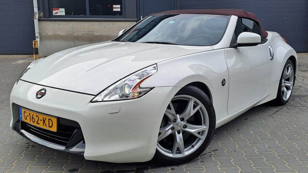 Nissan 370Z 3.7 V6/338pk/AUT/7Traps/Xenon/Recaro/Nieuwe APK, Auto's, Nissan, Automaat, Gebruikt, Cabriolet, Wit