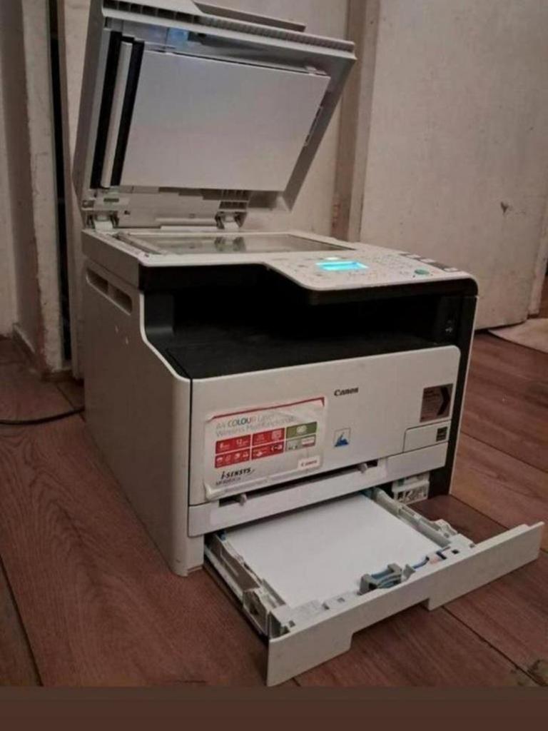 Te koop! Canon merk printer en scanner MF8080CW, Ophalen of Verzenden