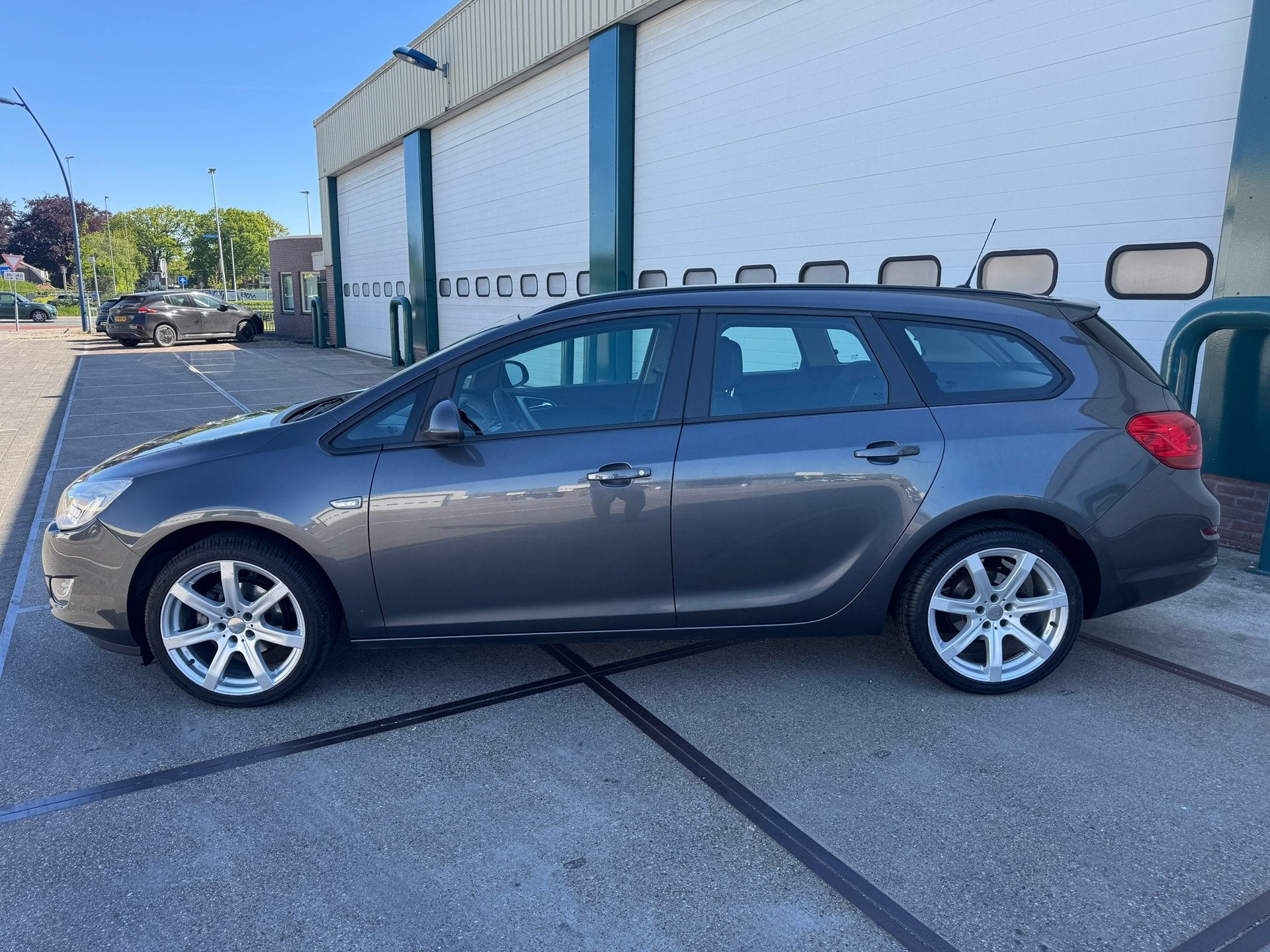 Opel Astra Sports Tourer 1.4 Edition, Auto's, Opel, Voorwielaandrijving, Euro 5, 4 cilinders, Origineel Nederlands