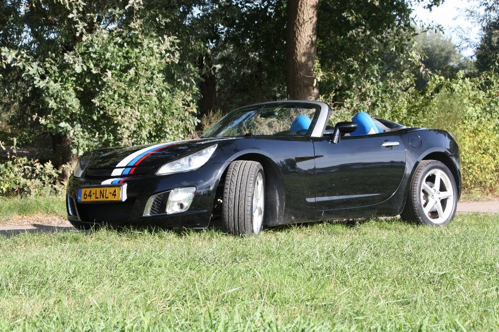 Opel GT 2.0 Turbo 2010 Special Edition 105.000 km, Auto's, Achterwielaandrijving, 4 cilinders, Cabriolet, Zwart
