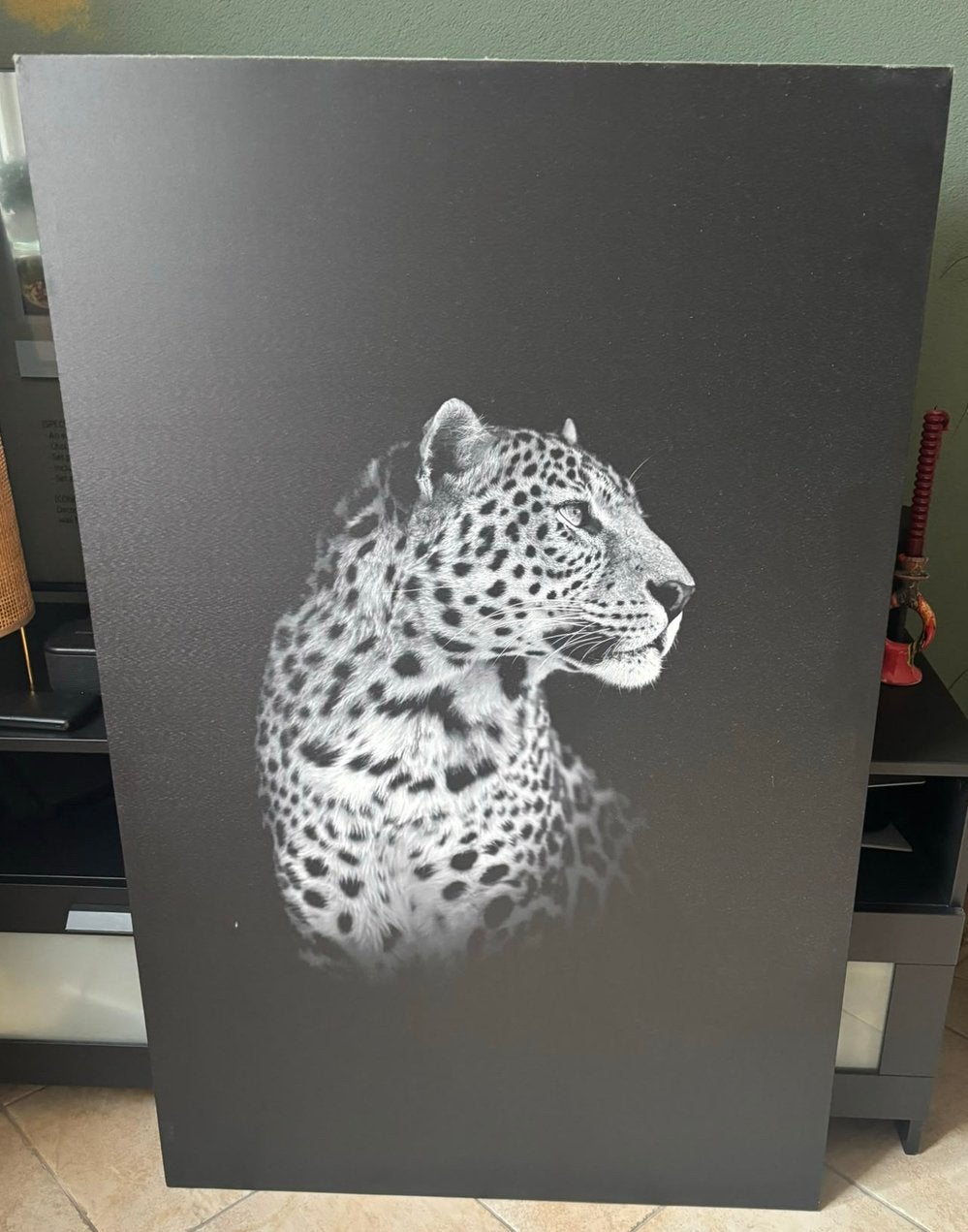 Panter schilderij, Ophalen