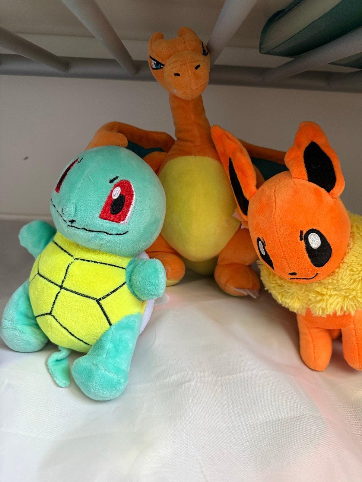 Pokémon knuffels: Charizard, Squirtle, Eevee, Ophalen of Verzenden, Zo goed als nieuw