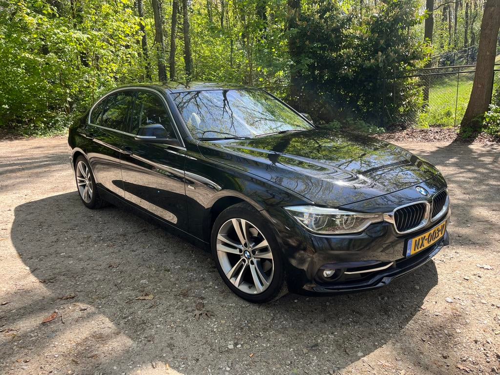 BMW 3-Serie 320i 184pk Aut 2017 Zwart met Nwe APK, 1998 cc, Achterwielaandrijving, 1800 kg, 4 cilinders