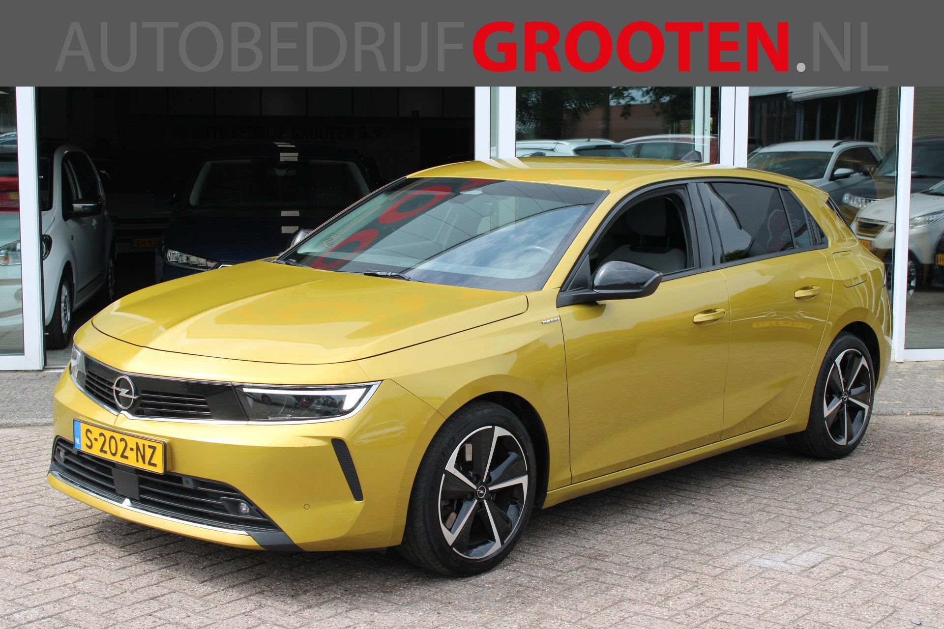 Opel Astra 1.6 Hybrid Business Edition (bj 2023, automaat), Auto's, Stof, Gebruikt, 4 cilinders, 150 pk