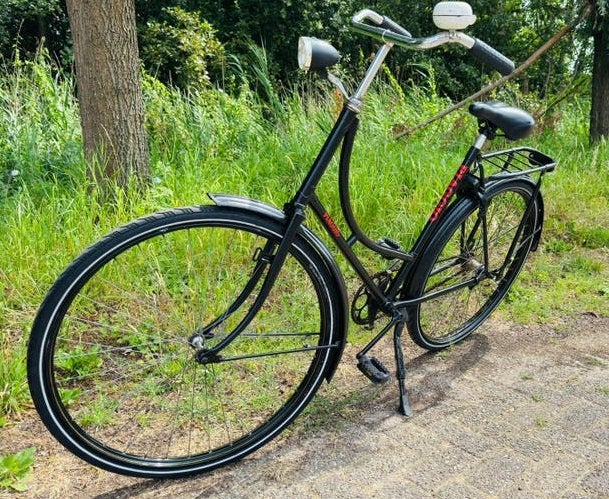 Leuke zwarte stationsfiets/omafiets, 28 inch, 57 cm hoog, Ophalen, 56 cm of meer, Zo goed als nieuw, Terugtraprem