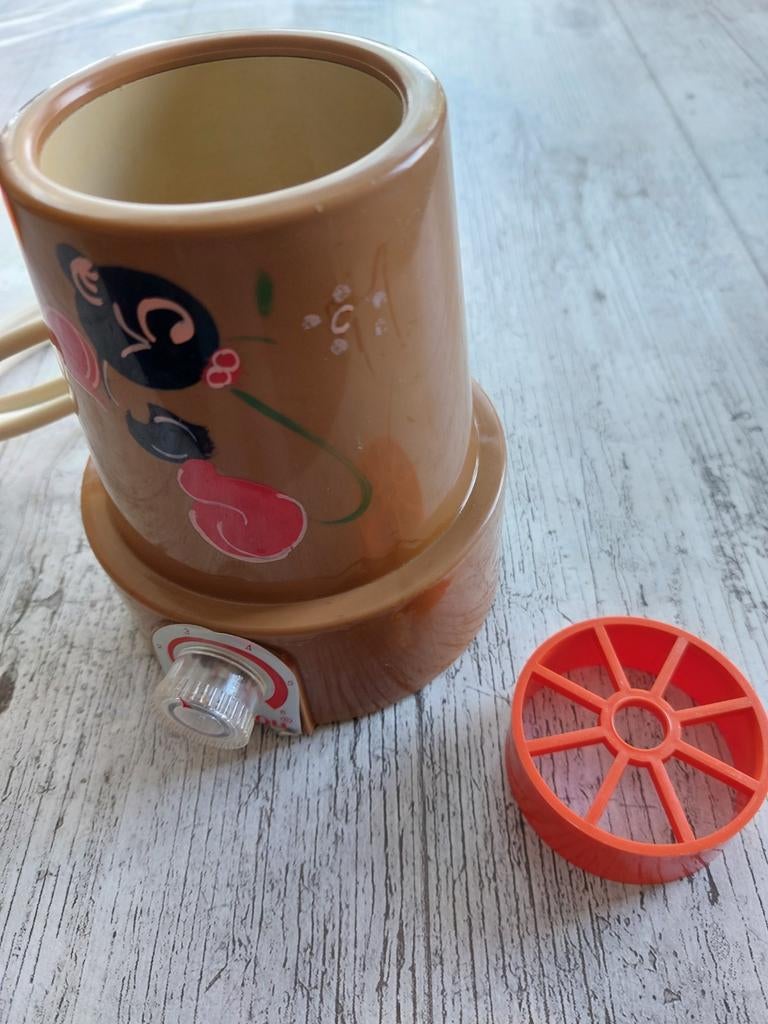 Flessenwarmer, Ophalen