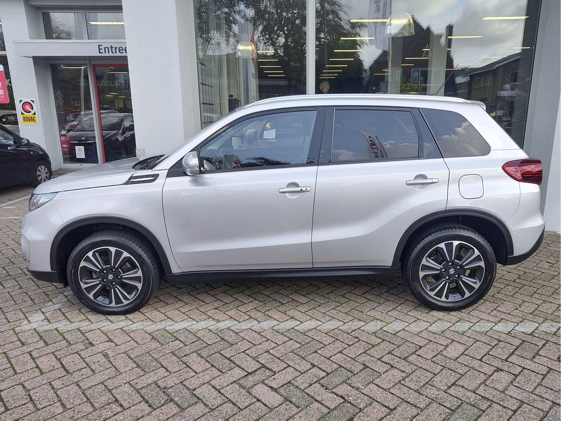 Suzuki Vitara 1.5 HYBRID STYLE AUTOMAAT Keyless | Dodehoekse, Auto's, Zwart, 4 cilinders, 116 pk, 19 km/l