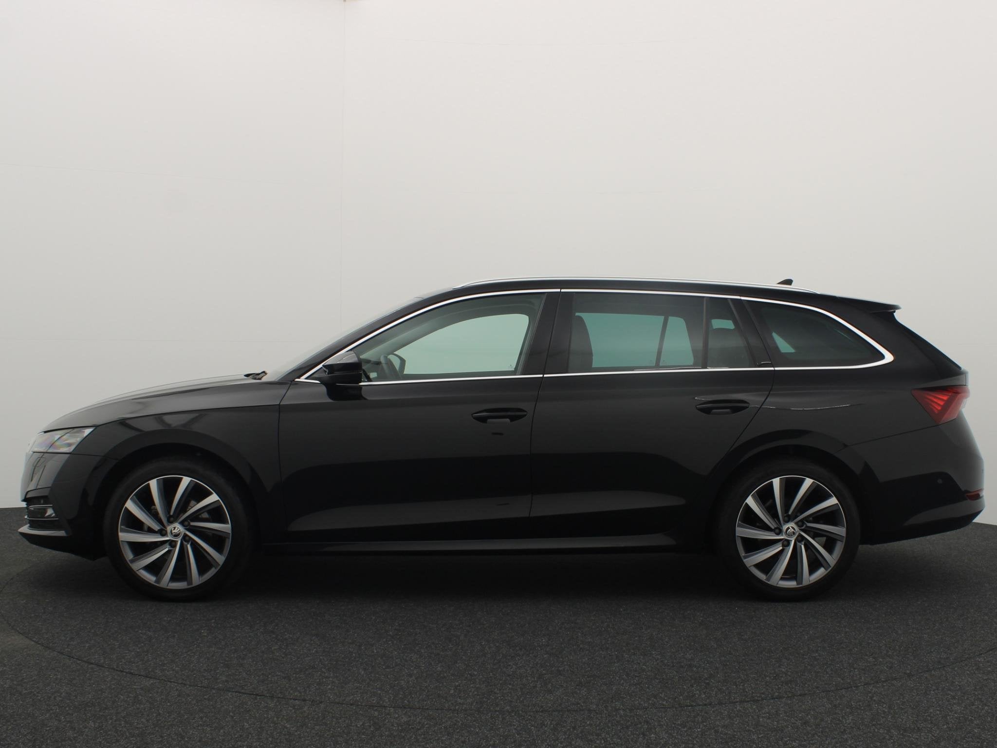 Skoda Octavia Combi 1.5 e-TSI Business Edition Plus AUTOMAAT, Auto's, 4 cilinders, Zwart, 1316 kg, Automatische klimaatregeling