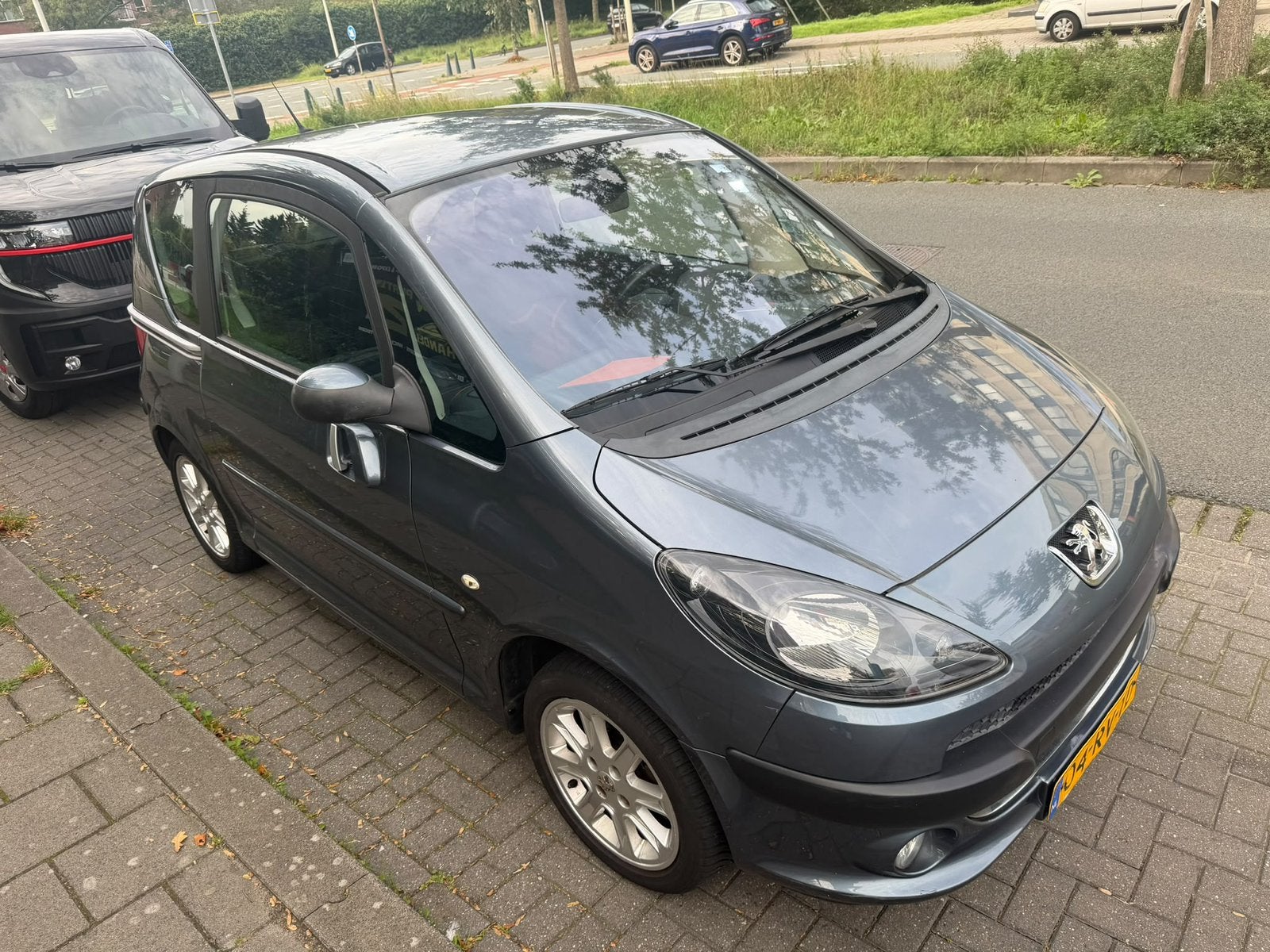 Peugeot 1007 1.6 16V Sporty autimaat 129000 km airco, Auto's, Zwart, 4 cilinders, 4 stoelen, Bedrijf