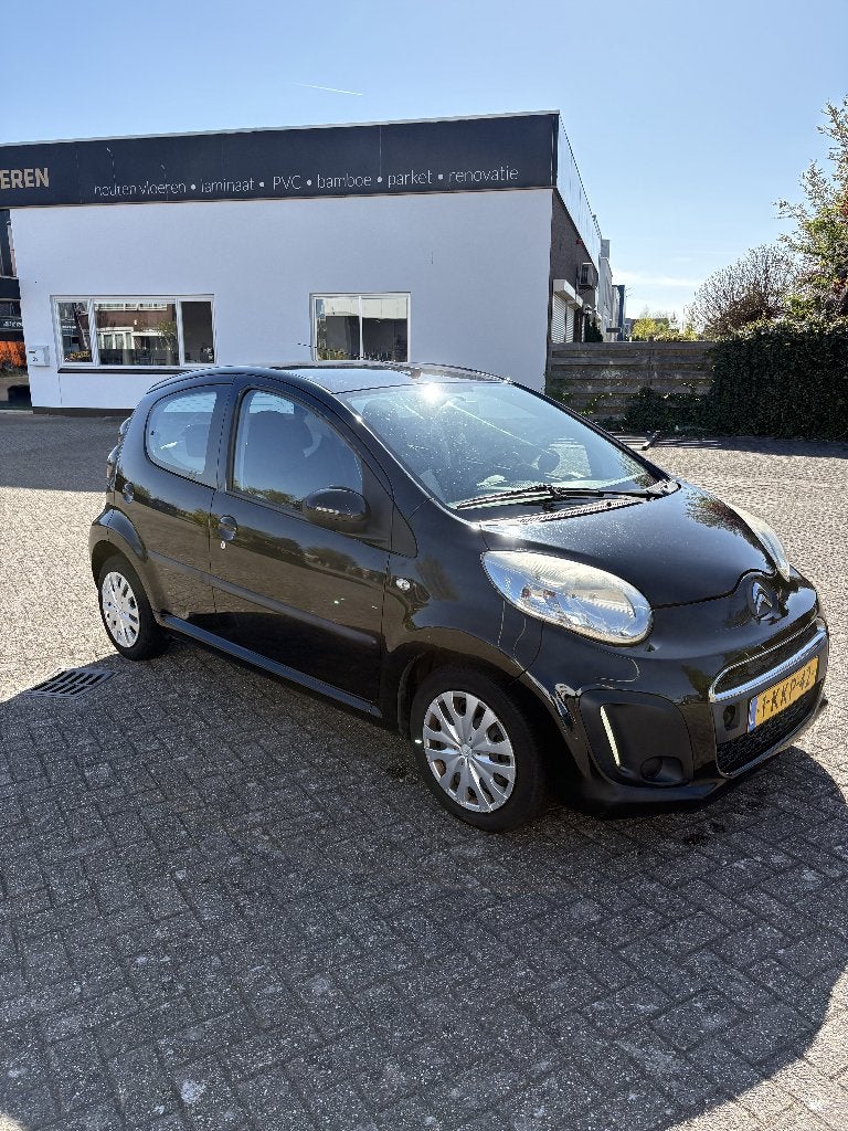 Citroën C1 1.0i 68PK 5D 2013 Zwart, Auto's, Voorwielaandrijving, Euro 5, Stof, Zwart