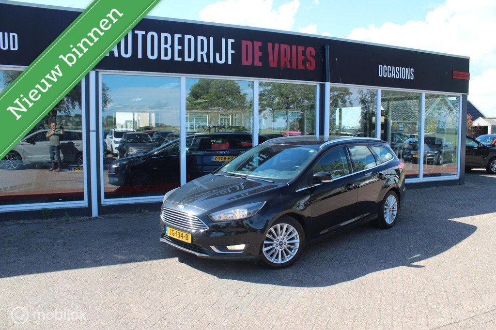 Ford Focus Wagon 1.5 TDCI Titanium Clima/Cruise/Navi/Trekhaa, Gebruikt, 4 cilinders, Zwart, Origineel Nederlands