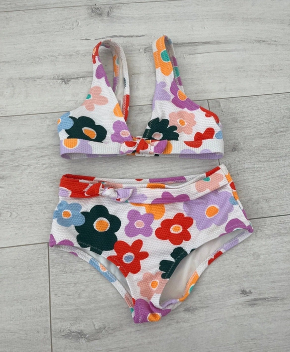 HEMA bikini met bloemenprint - Maat 110, Ophalen of Verzenden, Zo goed als nieuw, Overige kleuren, Bikini