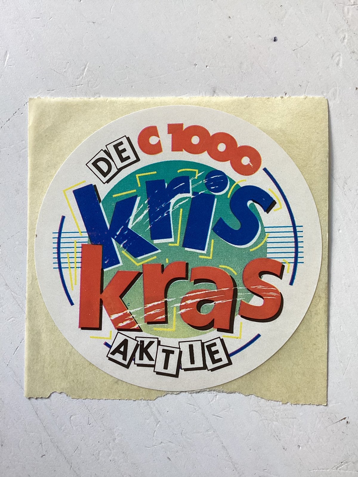 Sticker De C1000 Kris Kras Aktie, Verzenden, Zo goed als nieuw, Winkel of Supermarkt