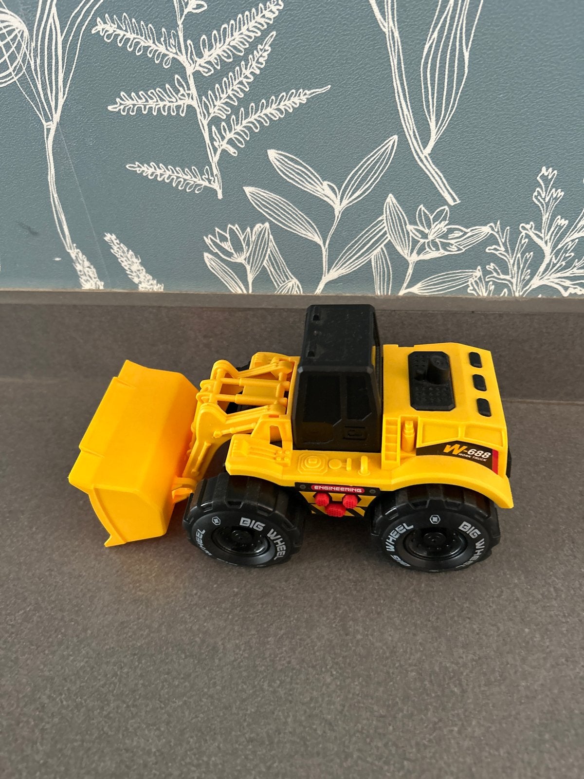 Gele speelgoed graafmachine - WL-688 Big Wheel, Ophalen, Zo goed als nieuw