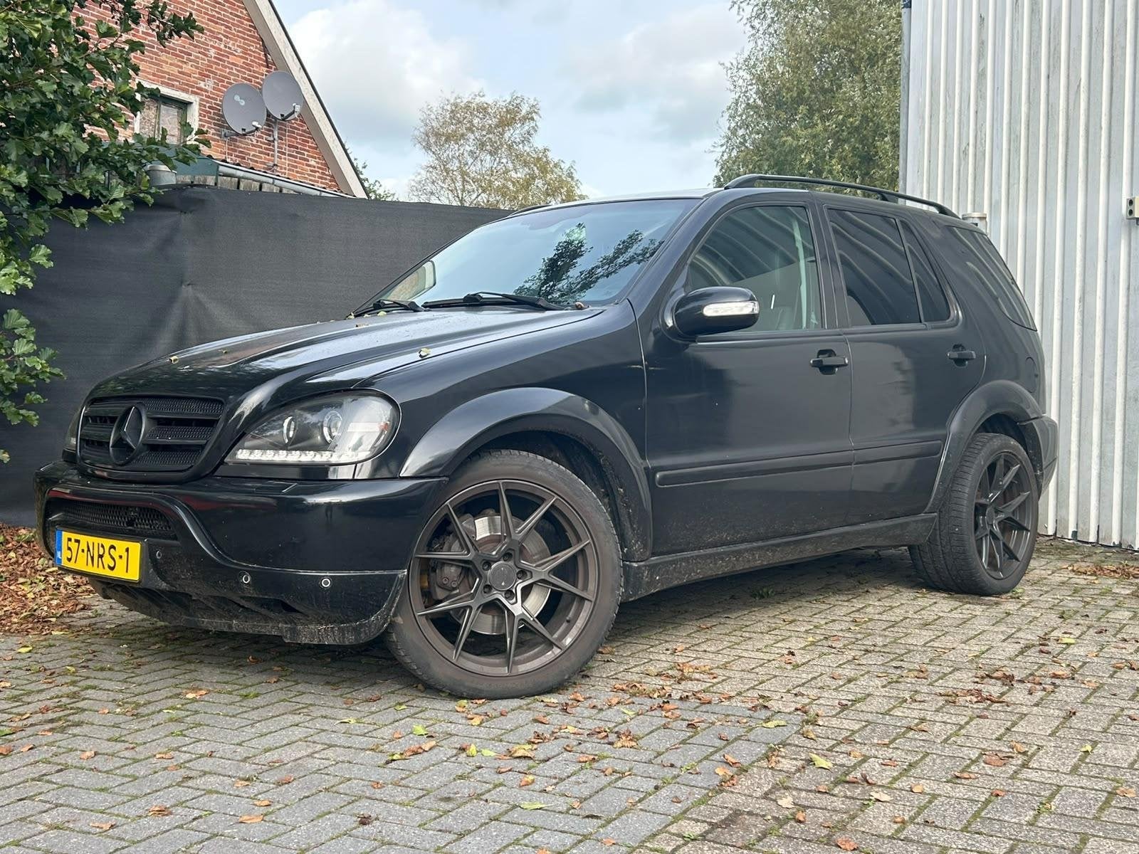 Mercedes M-klasse AMG 55, Auto's, Automaat, 347 pk, Zwart, Leder