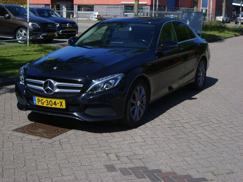 Mercedes-Benz C-Klasse 180 Prestige Automaat (bj 2016), Auto's, Automaat, 12 maanden, Zwart, Bedrijf