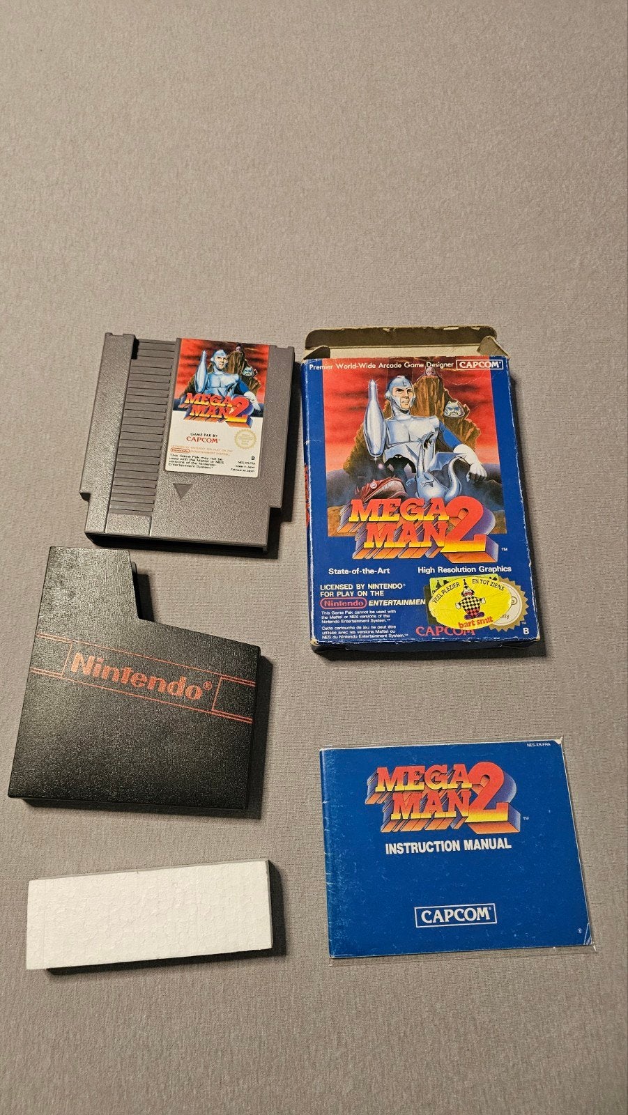 Mega Man 2 (NES) - Compleet met doos en handleiding, Spelcomputers en Games, Games | Nintendo NES, Ophalen, Gebruikt, 1 speler
