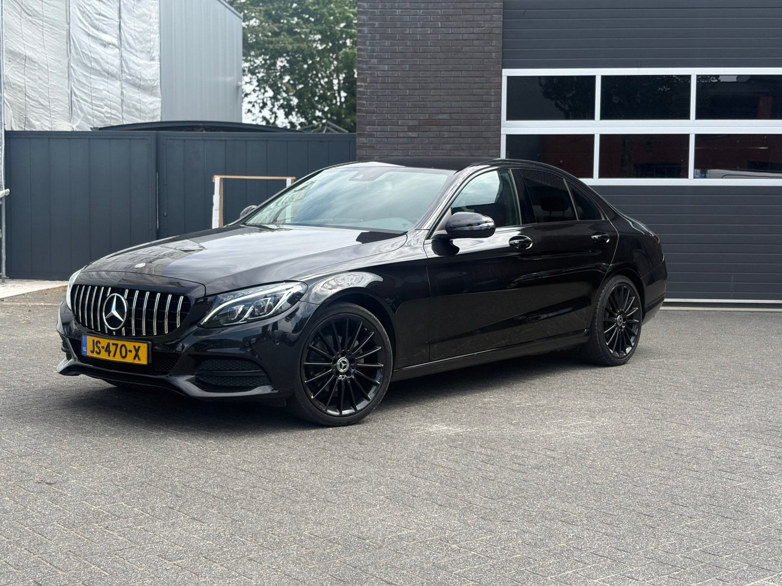 Mercedes-Benz C-Klasse C180 1.6 115KW Aut7 2015 Zwart, Automaat, 1800 kg, Zwart, Leder en Stof