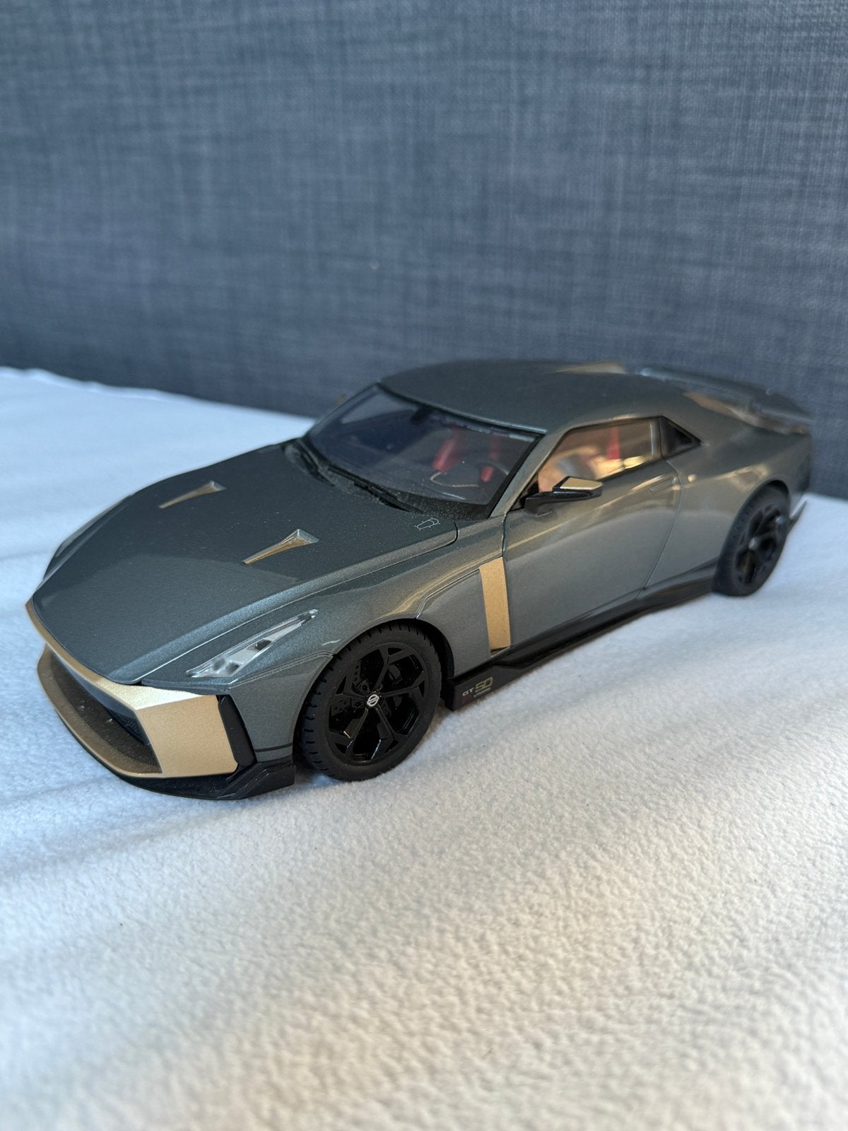 Nissan GT 50, Ophalen of Verzenden, Zo goed als nieuw, Bburago