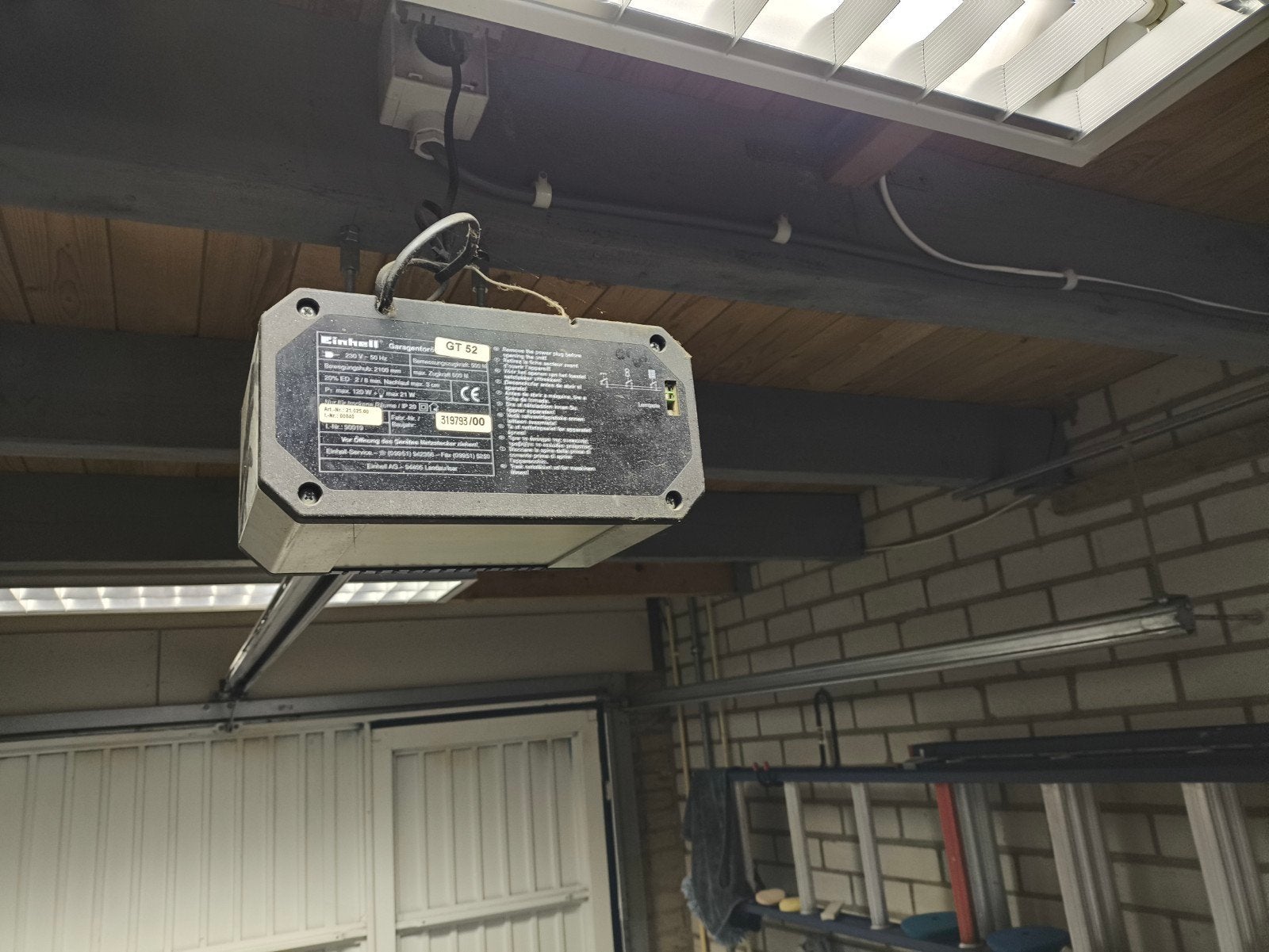 Elektrische garagedeur opener met 2 handzenders., Ophalen, Gebruikt, 120 cm of meer, Garagedeur