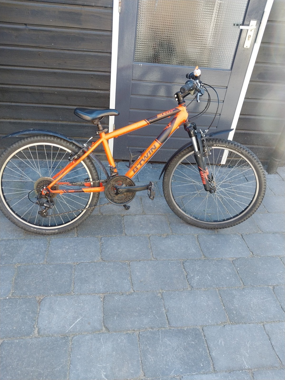 B'Twin Rockrider 500 Mountainbike Oranje, Fietsen en Brommers, Gebruikt, Heren, 45 tot 49 cm, Geen vering
