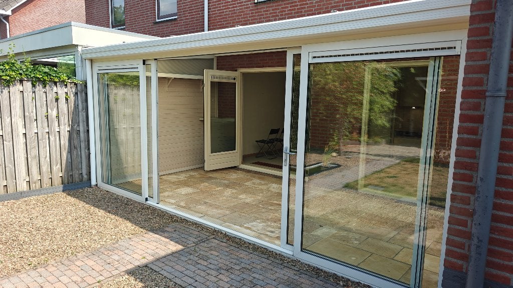 Complete serre met isolerende HR++ schuifpui 5,7 meter, Ophalen, Zo goed als nieuw, Serre
