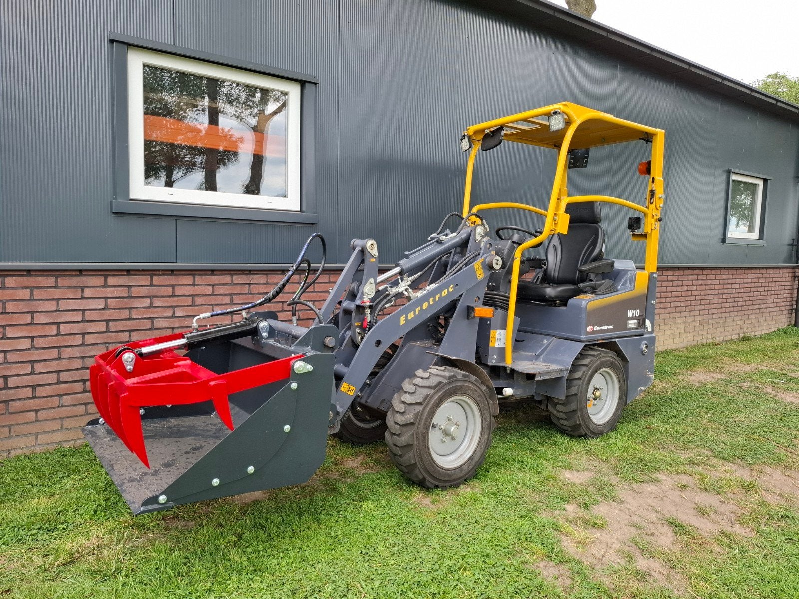 Eurotrac w10, bwjr 2023, 550hr., Zakelijke goederen, Machines en Bouw | Kranen en Graafmachines, Ophalen, Wiellader of Shovel