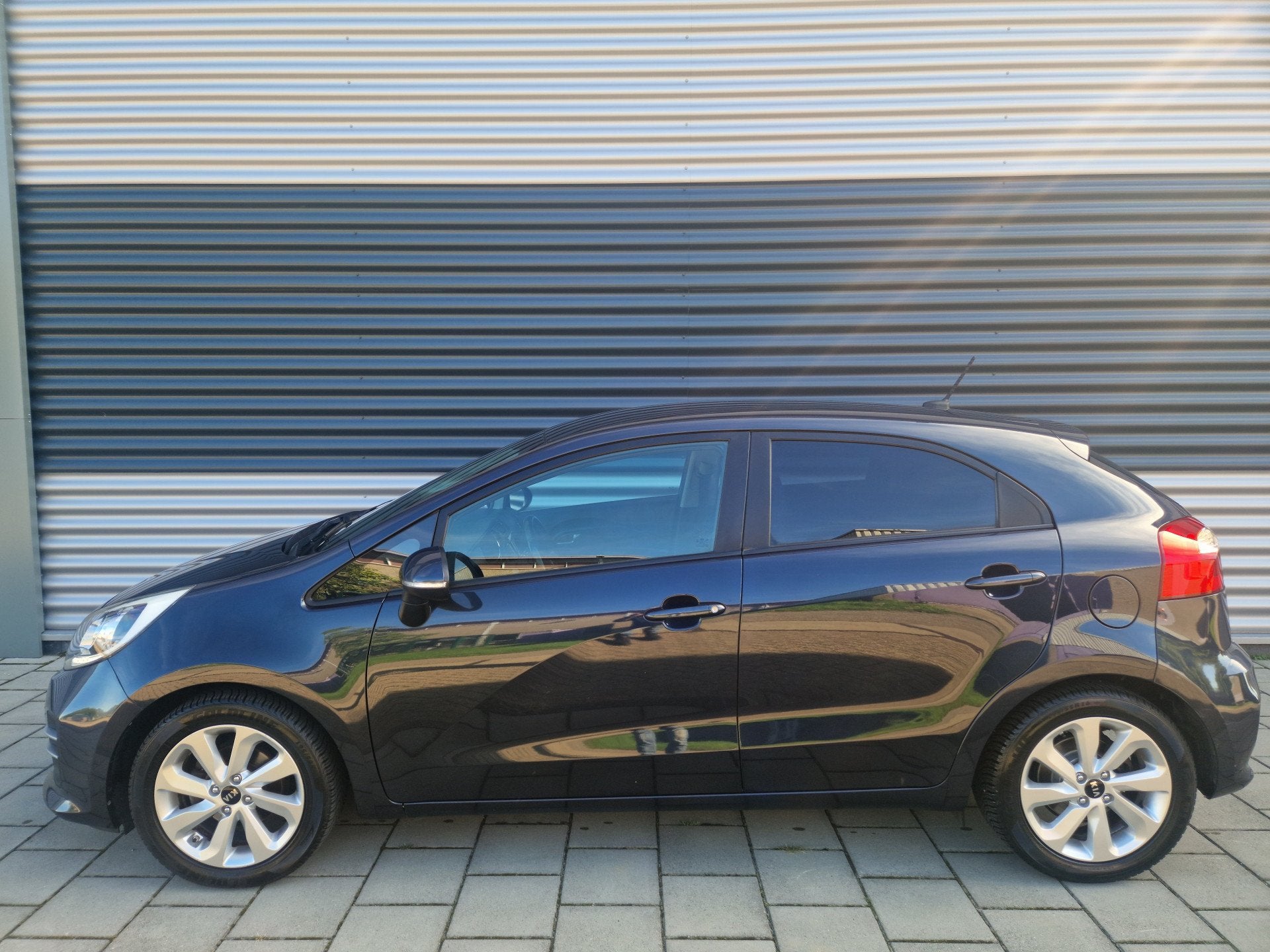 Kia Rio 1.2 CVVT ExecutiveLine (bj 2016), Auto's, Euro 6, 4 cilinders, Blauw, Bedrijf