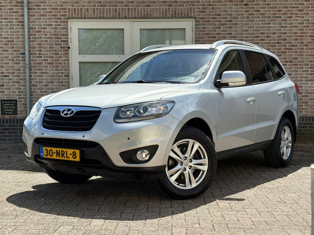 Hyundai Santa Fe 2.4i CVVT Dynamic Clima Navi T.haak NAP, Auto's, Voorwielaandrijving, Euro 5, Gebruikt, 4 cilinders