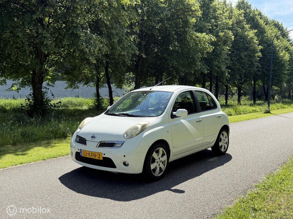 Nissan Micra 1.2 Connect Edition*AUTOMAAT*PARKEERSENSOR*AIRC, Auto's, Nissan, Zwart, 4 cilinders, Parkeersensor, Wit
