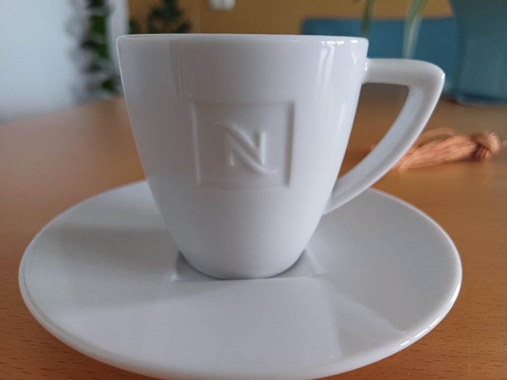 Set van 5 espresso kop en schoteltjes, van Nespresso., Ophalen of Verzenden, Zo goed als nieuw, Overige stijlen, Kop(pen) en/of Schotel(s)