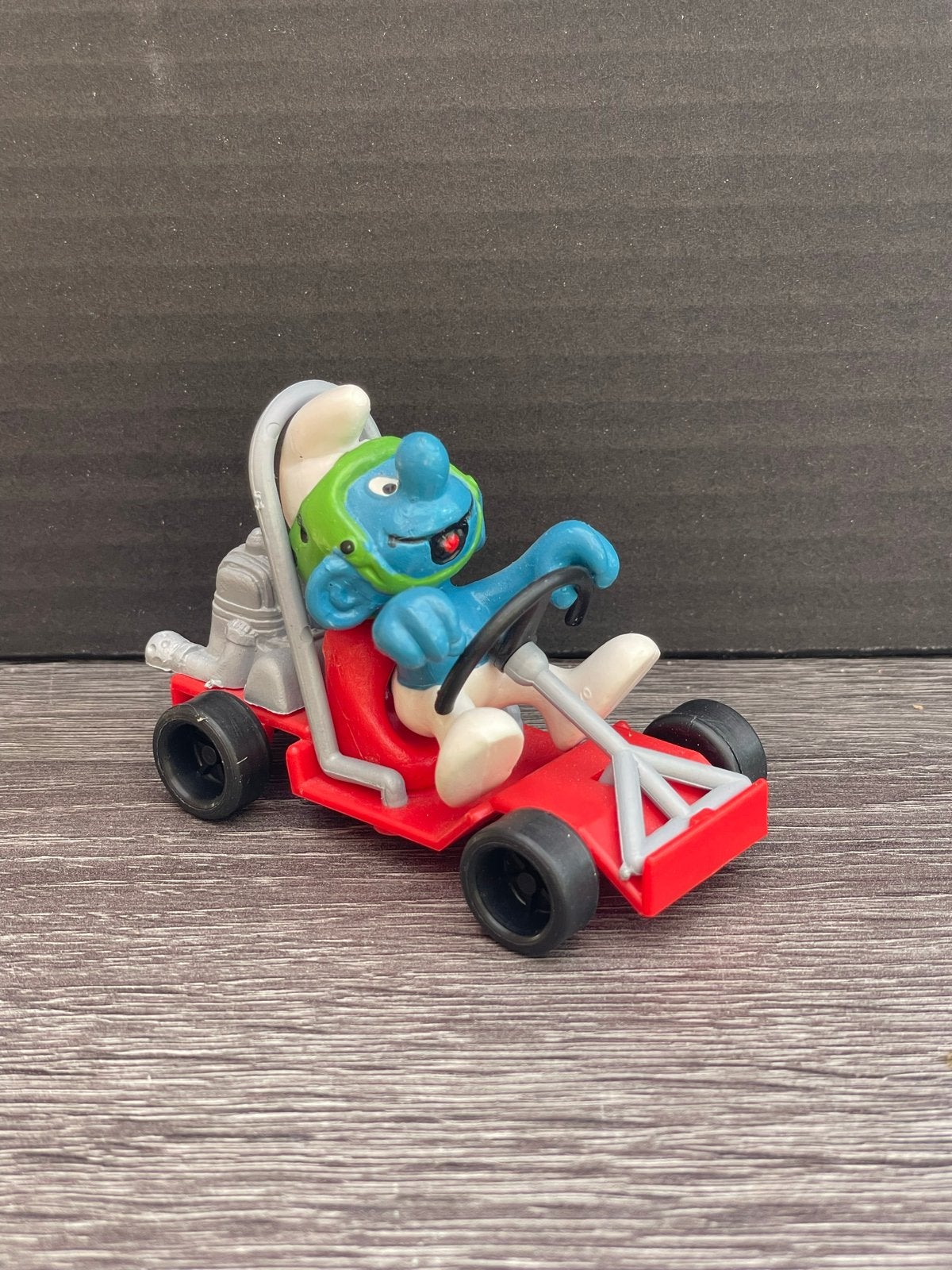 Smurf in kart - Vintage Smurfen figuur, Ophalen of Verzenden, Gebruikt, Overige Smurfen, Poppetje, Figuurtje of Knuffel