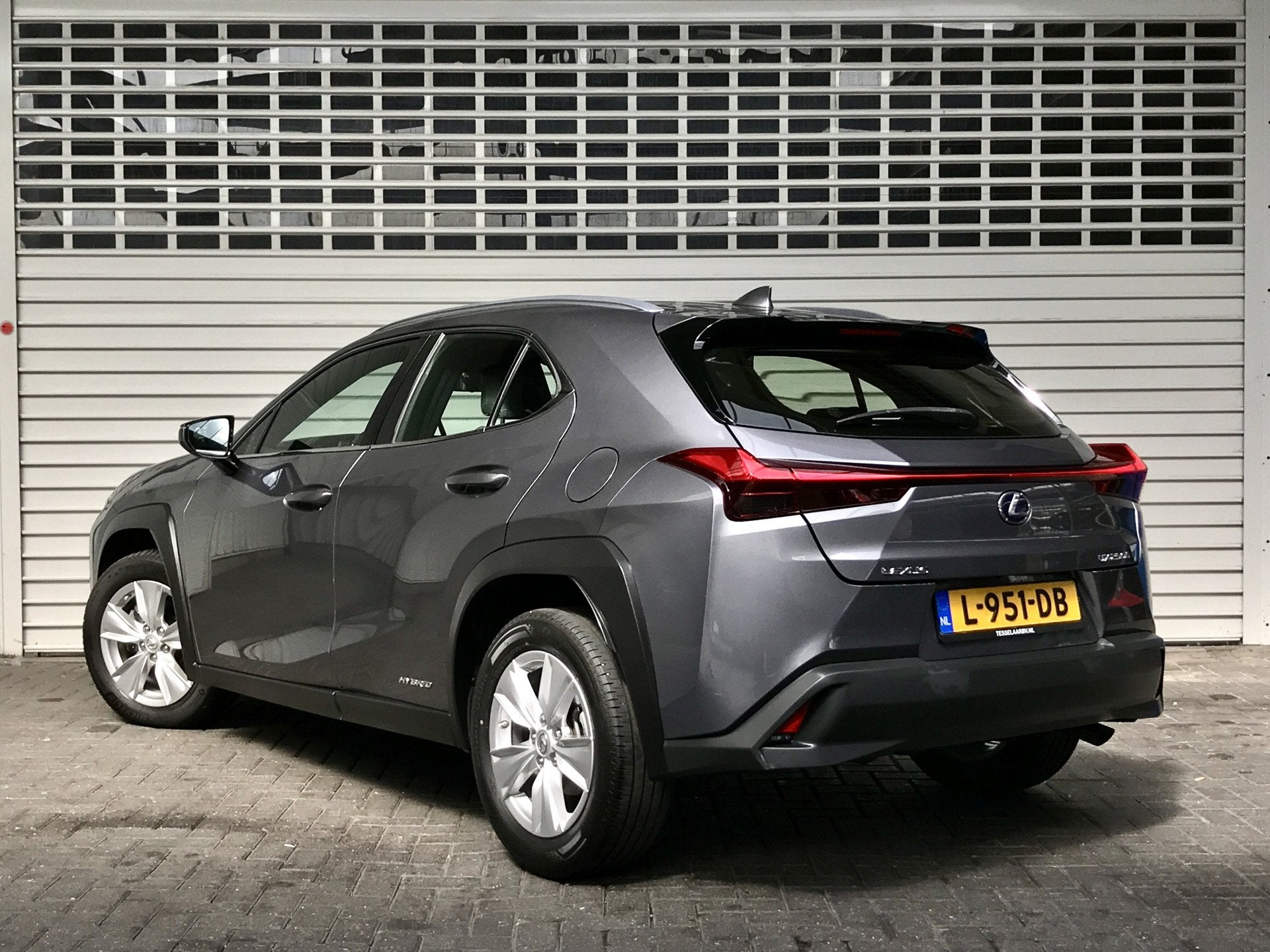 Lexus UX 250h Pro Edition Rijklaarprijs! (bj 2020), Auto's, Gebruikt, 4 cilinders, Alcantara, Grijs
