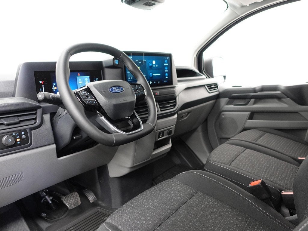 Ford Transit Custom 300 2.0 TDCI L2H1 Trend Nieuw Model Auto, Auto's, Bestelauto's, 4 cilinders, 2800 kg, Zwart, Origineel Nederlands