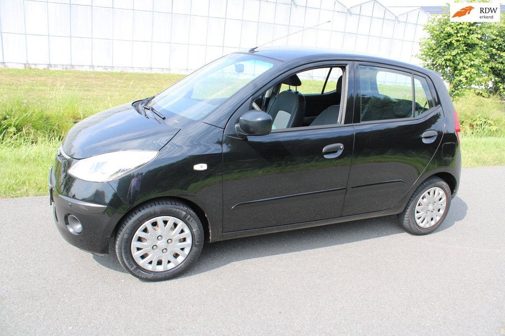 Hyundai I10 1.1 Active Automaat met Airco, Auto's, Hyundai, Gebruikt, 31 €/maand, 4 cilinders, Zwart