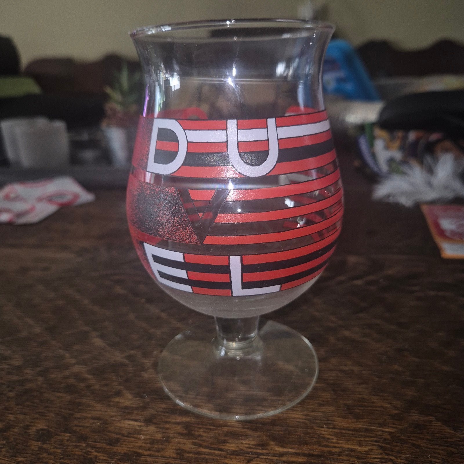 Duvel bierglas - rood/zwart gestreept, Gebruikt, Meerkleurig, Ophalen of Verzenden, Modern