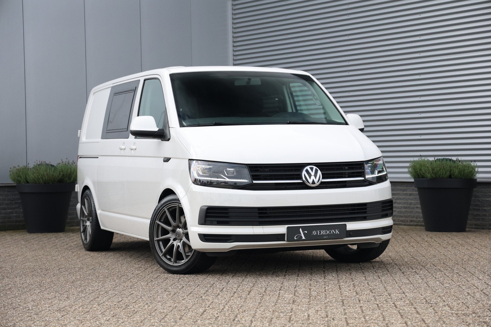 Volkswagen Transporter 2.0 TSI L1H1 Highline Benzine Trekhaa, Auto's, Voorwielaandrijving, Stof, Gebruikt, 4 cilinders