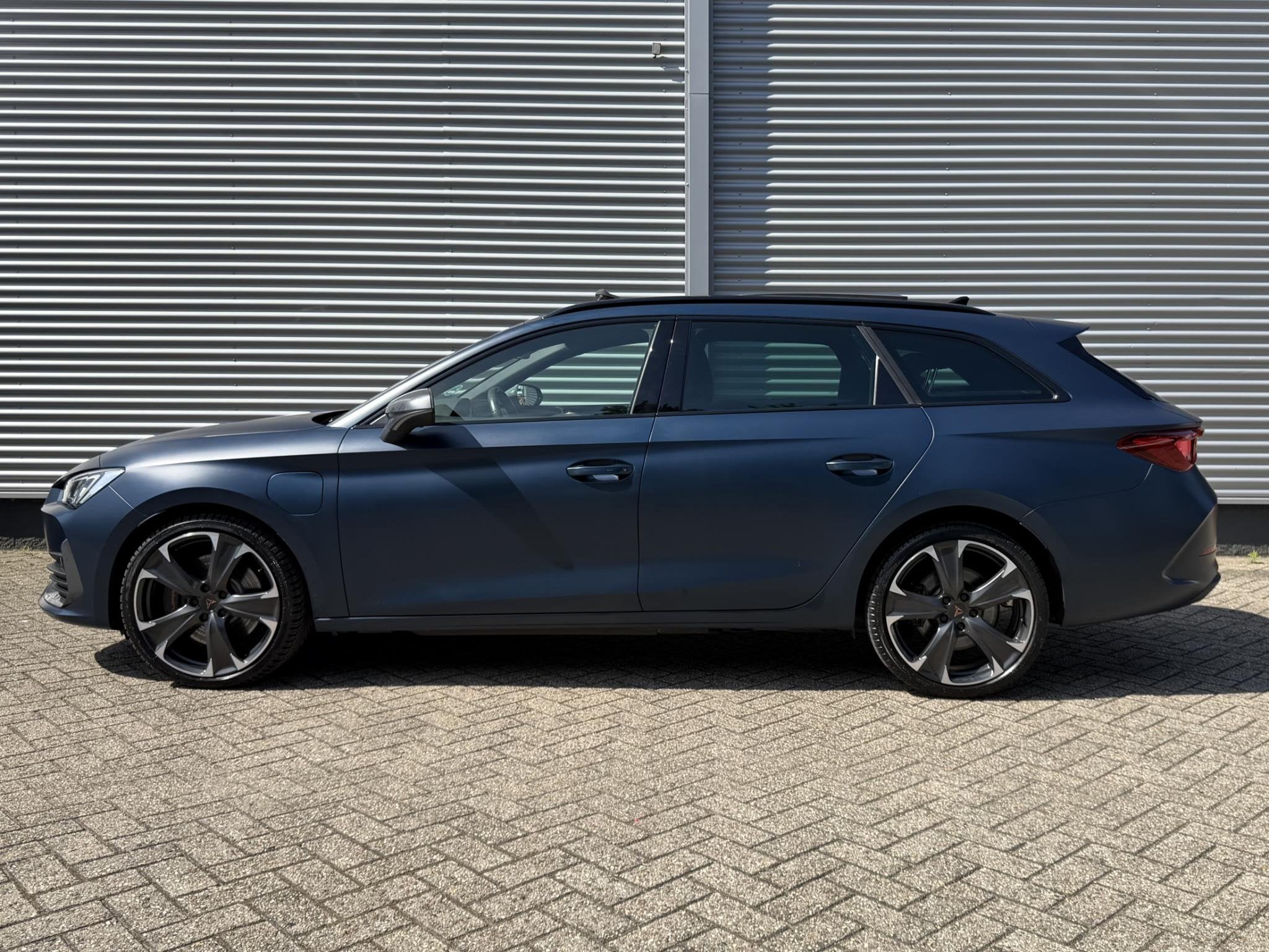 CUPRA Leon Sportstourer 1.4 e-Hybrid VZ Business | Schuif/Ka, Auto's, Stof, Gebruikt, 4 cilinders, Automatische klimaatregeling