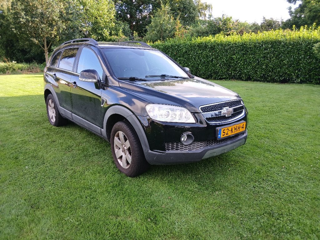 Chevrolet Captiva 2.4 4WD 2009 Zwart, Auto's, Chevrolet, 136 pk, Zwart, 4 cilinders, 7 stoelen