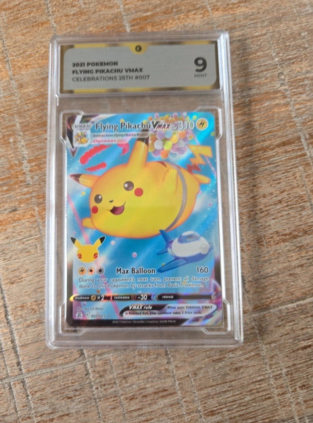 Pokemon Flying Pikachu VMAX Celebrations 25th #007 PSA 9, Ophalen of Verzenden, Nieuw, Losse kaart