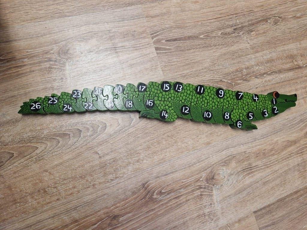 puzzel krokodil, Ophalen, 10 tot 50 stukjes, Zo goed als nieuw, Van hout